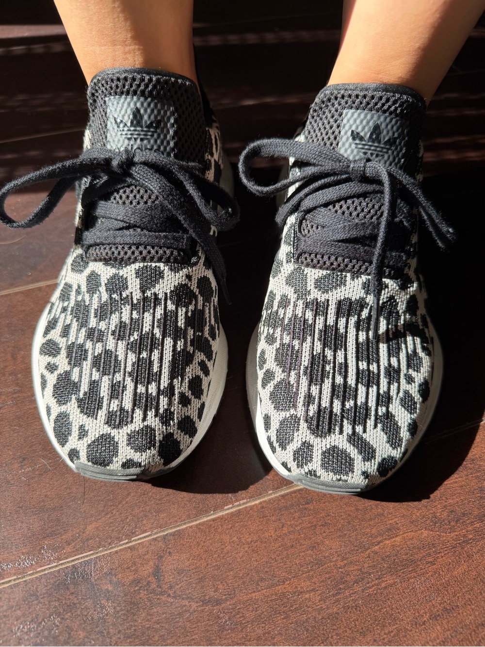 adidas women’s White Leopard Knit Sneakers